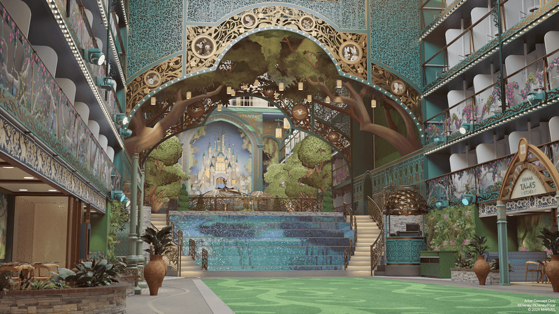 A lush central courtyard with a stage is framed by ornate tree themed accents and a three story high storybook castle art piece against the far wall. 