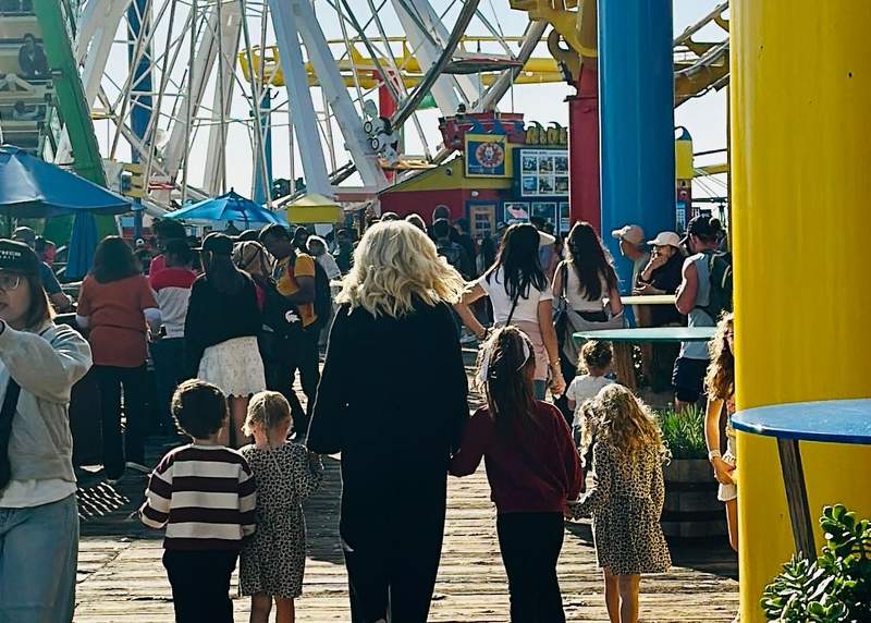 Multi generational family enjoying the Santa Monica Pier together