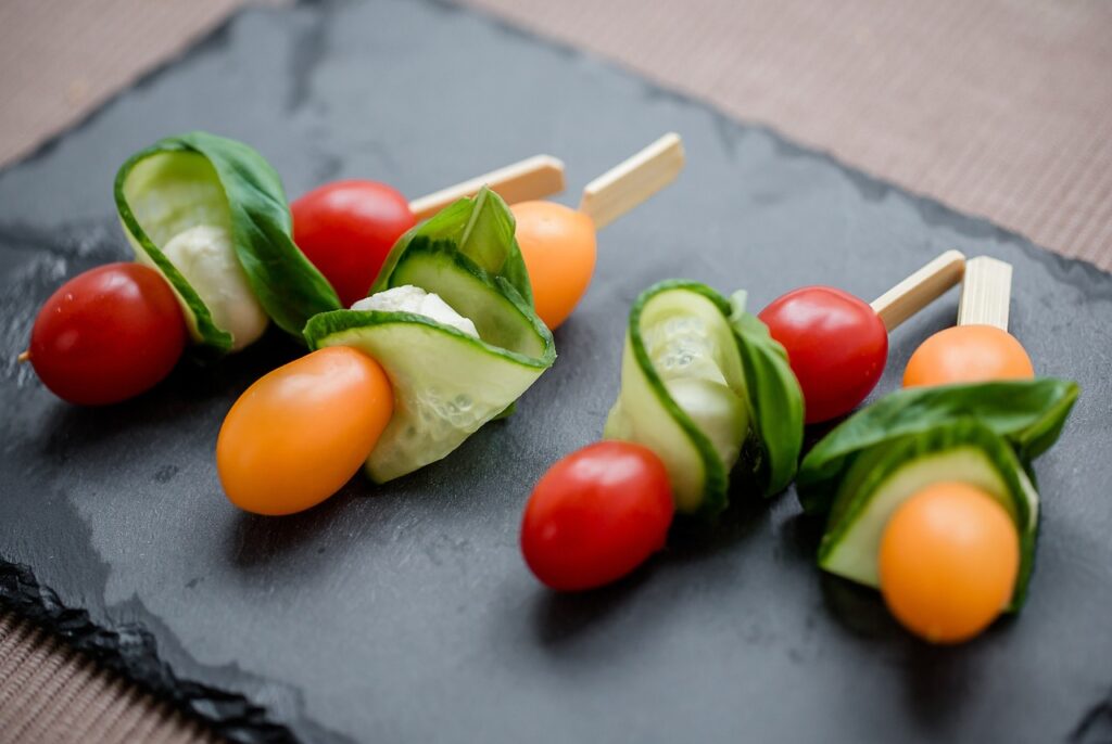 Tomatoes, cheese and cucumbers on a stick for a healthy snack