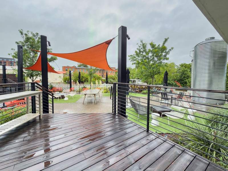 The Longleaf Hotel patio on the north side of downtown Raleigh blends mid century modern design with relaxed Southern charm.