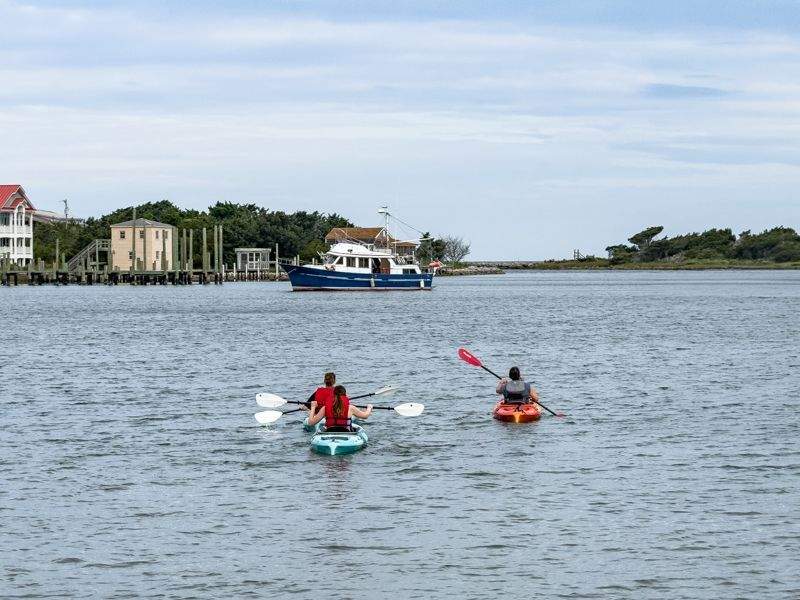 Kayaking across Silver Lake in Ocracoke offers calm waters stunning bay views and a front row seat to Outer Banks coastal life.