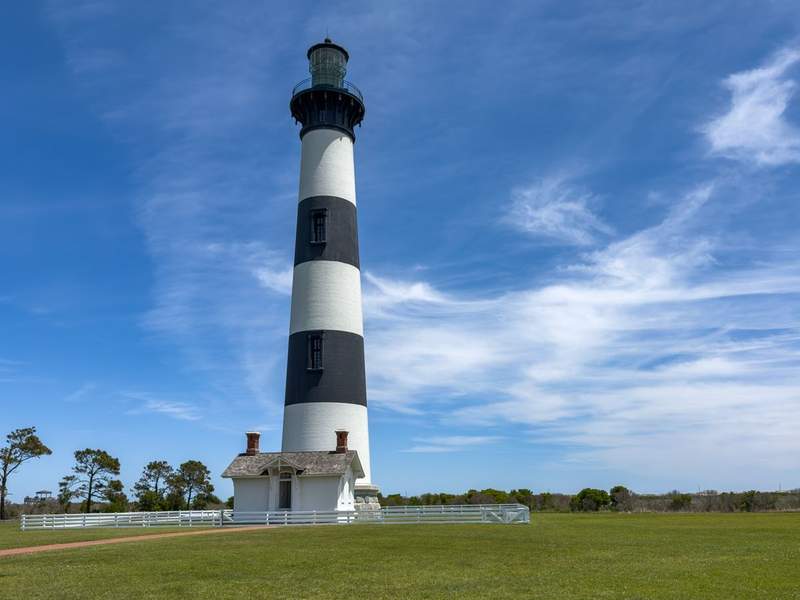 Bodie Island Lighthouse Nags Head iconic black and white daymarks and a 214 step climb at the north end of Cape Hatteras National Seashore. 