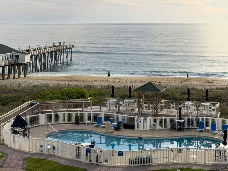 Ocean view balcony at Hilton Garden Inn Kitty Hawk overlooking the Atlantic and pier Outer Banks NC.