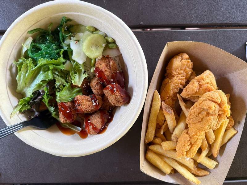 Vegan veggie bowl chicken fingers and french fries.
