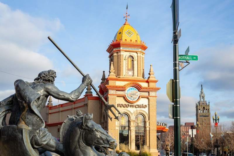 A beautifully ordinate building is the backdrop for one of Kansas Citys more than 200 fountains.