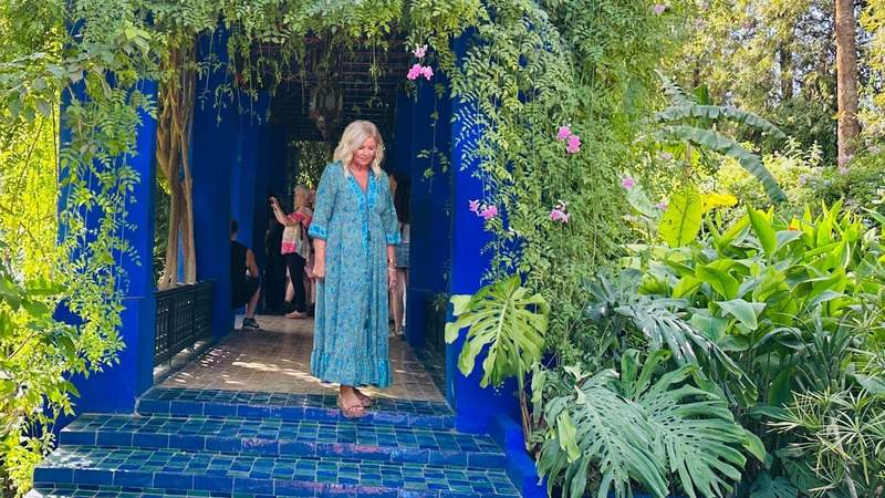 A woman exploring the Jardin Majorelle in Marrakech Morocco. 