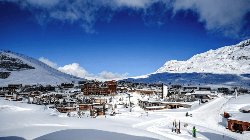 Ski resort surrounded by heavy snow and untouched slopes.