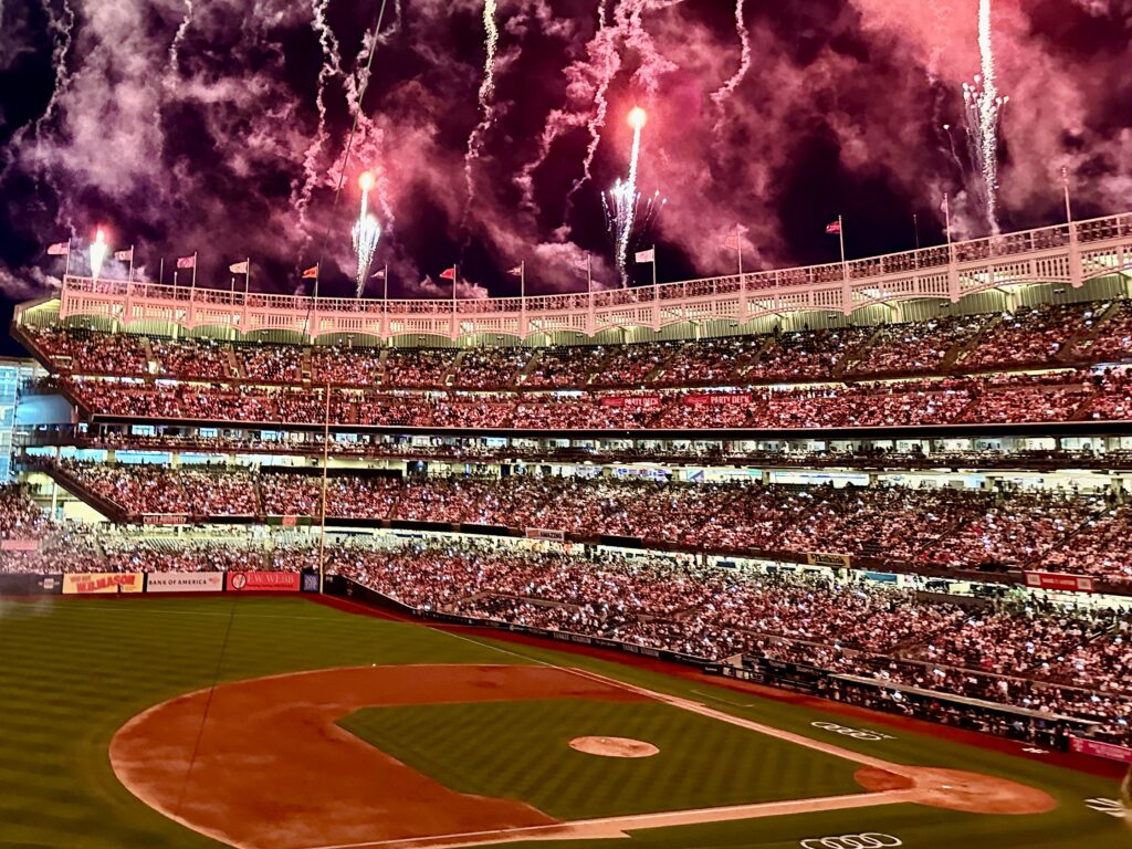 Fourth of July fireworks in the Yankee Stadium outfield.