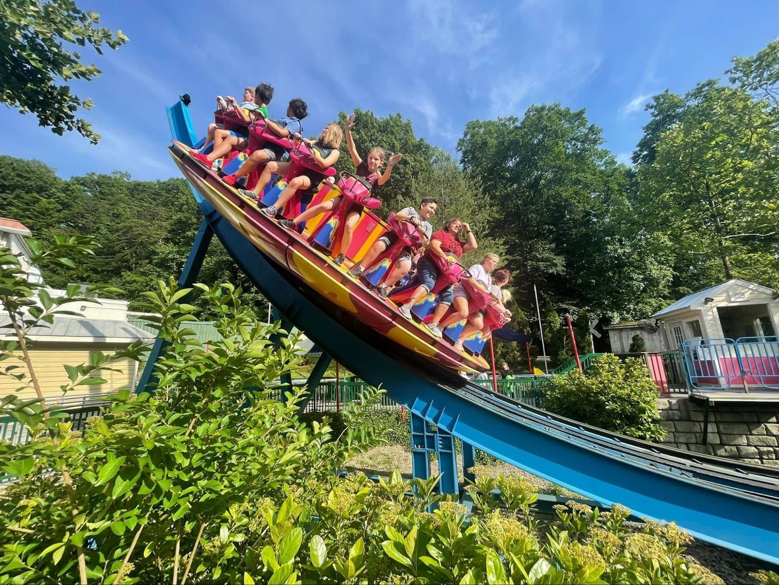 Children riding an amusement ride at Dollywood, one of the best places to visit in Tennessee.