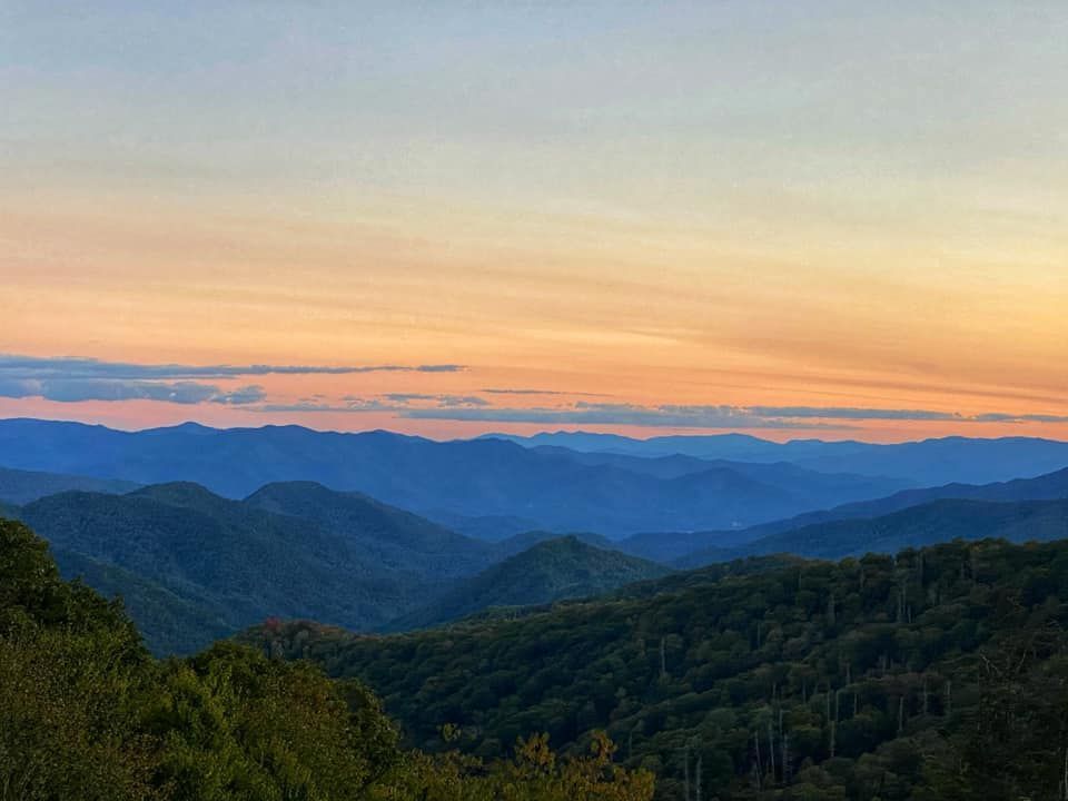 Mountains at sunset at the Great Smoky Mountains National Park, one of the best places to visit in Tennessee