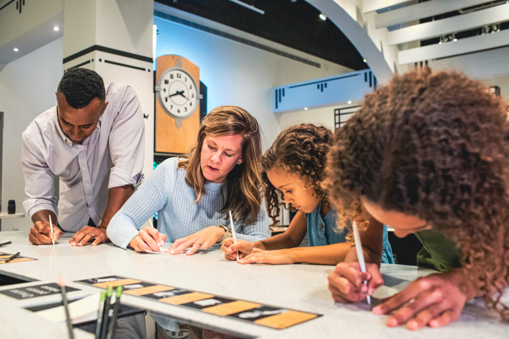 A family making art at the Frist Art Museum in Nashville TN