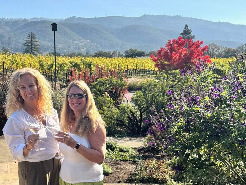 Kim and Linda sipping Lasseter Family Winery Rose overlooking the colorful landscape in Sonoma CA.