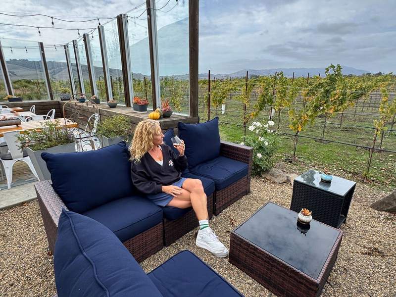 Kim Orlando relaxing near the vineyards at Anaba Winery in Sonoma CA.