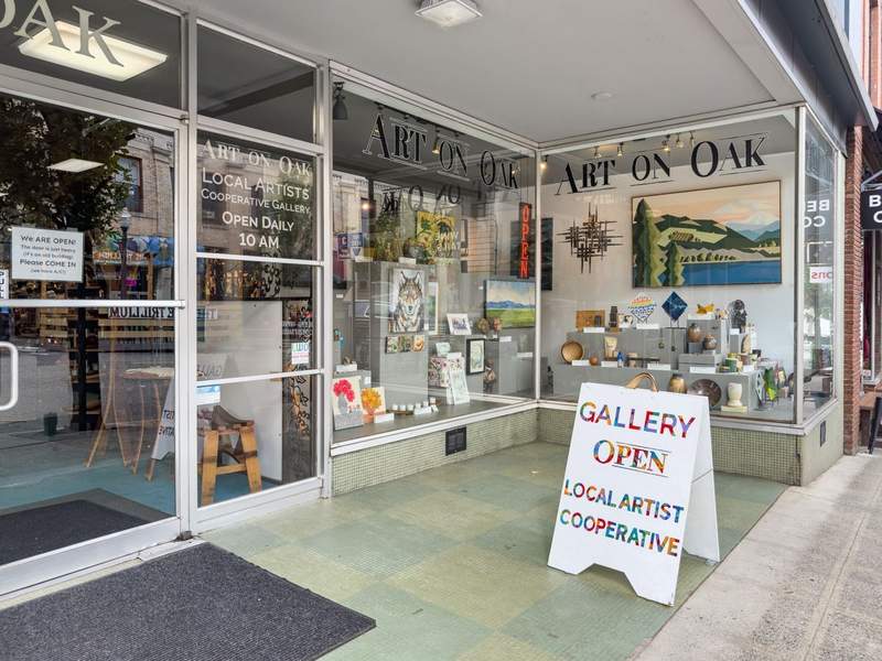 art gallery window with signs 
