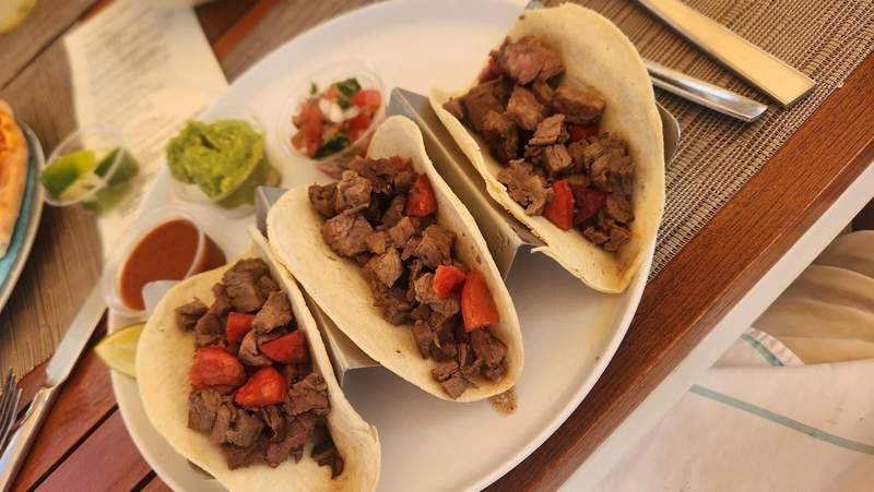Plate of three tacos.