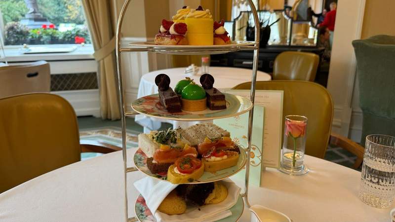tea stand with scones and finger sandwiches and pastries from the afternoon tea at The Shelbourne.