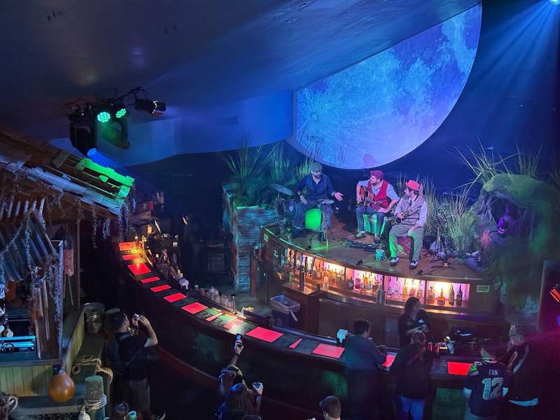 Three man jazz band on stage at Universal Florida Mardi Gras