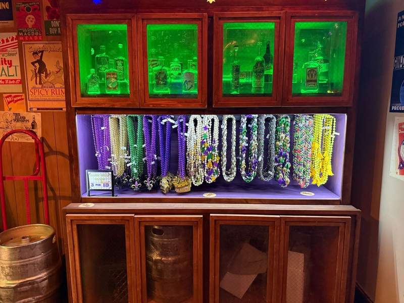 Theme park shop selling beads and Mardi Gras accessories