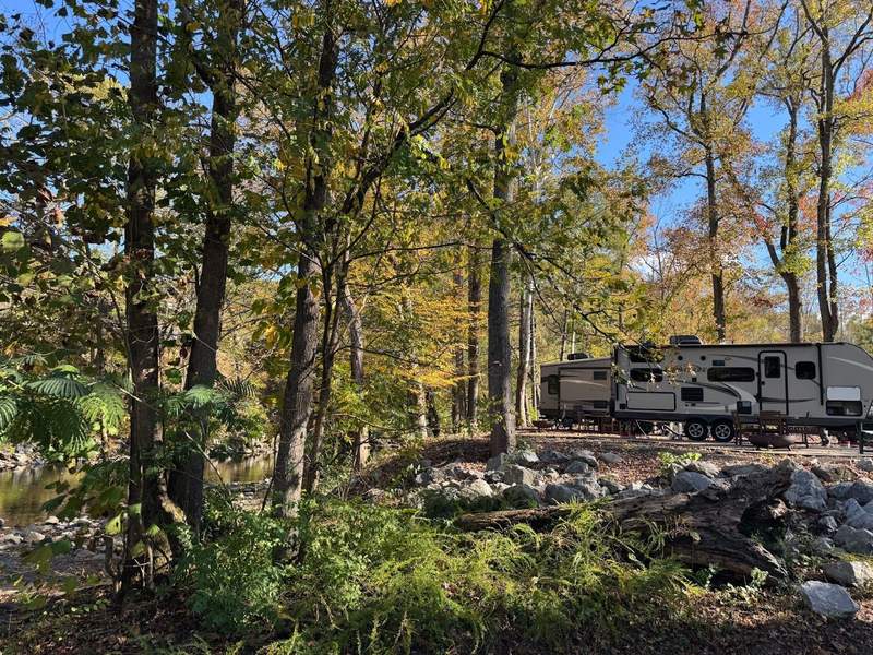 A riverfront RV campsite at the Townsend Great Smokies KOA