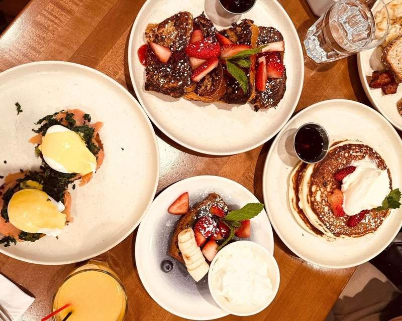 Plates of gluten free breakfast food on a table at Friedmans Restaurant in New York City.