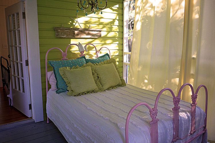blue, green and pink cottage bed in a Tybee Island beach house rental