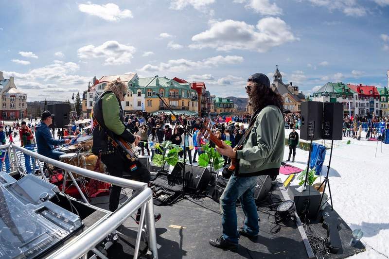 Musicians play on stage in the colorful Mont Tremblant village for their Après Ski spring festival.