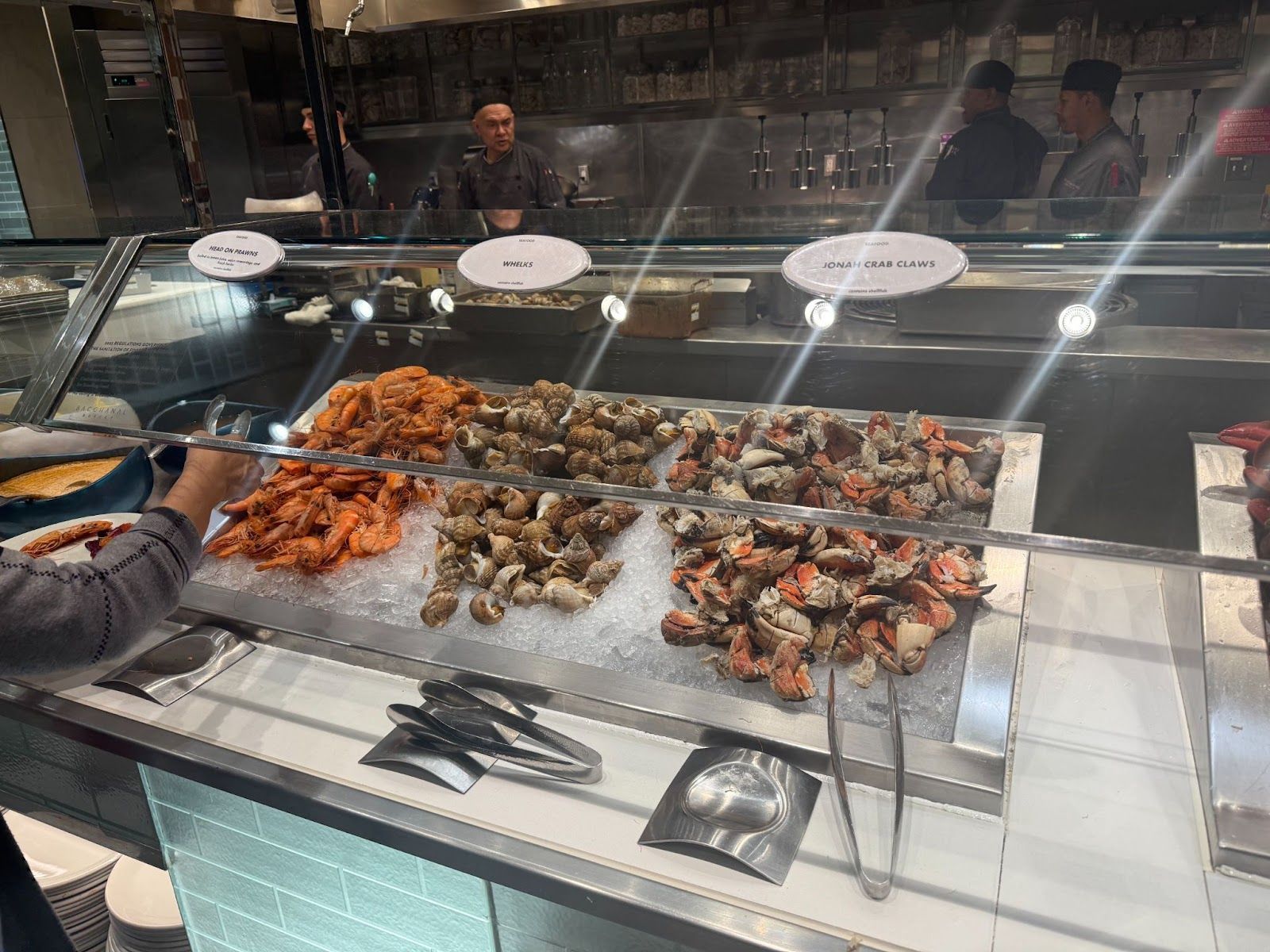 a seafood selection with crab claws and shrimp
