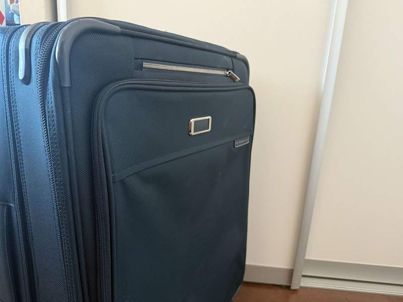 Briggs & Riley suitcase side view in daylight