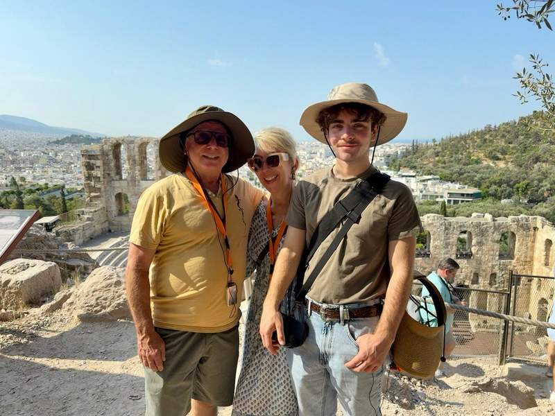Family posing in the Acropolis ruins.