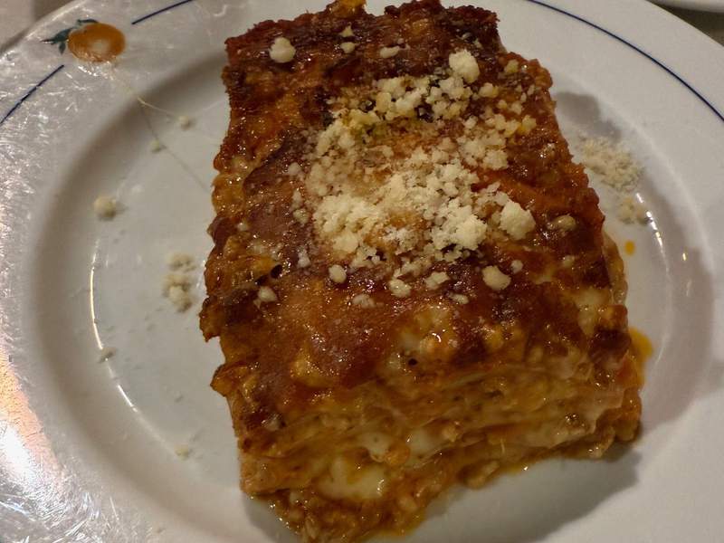 A piece of lasagna at a Roman cafe.