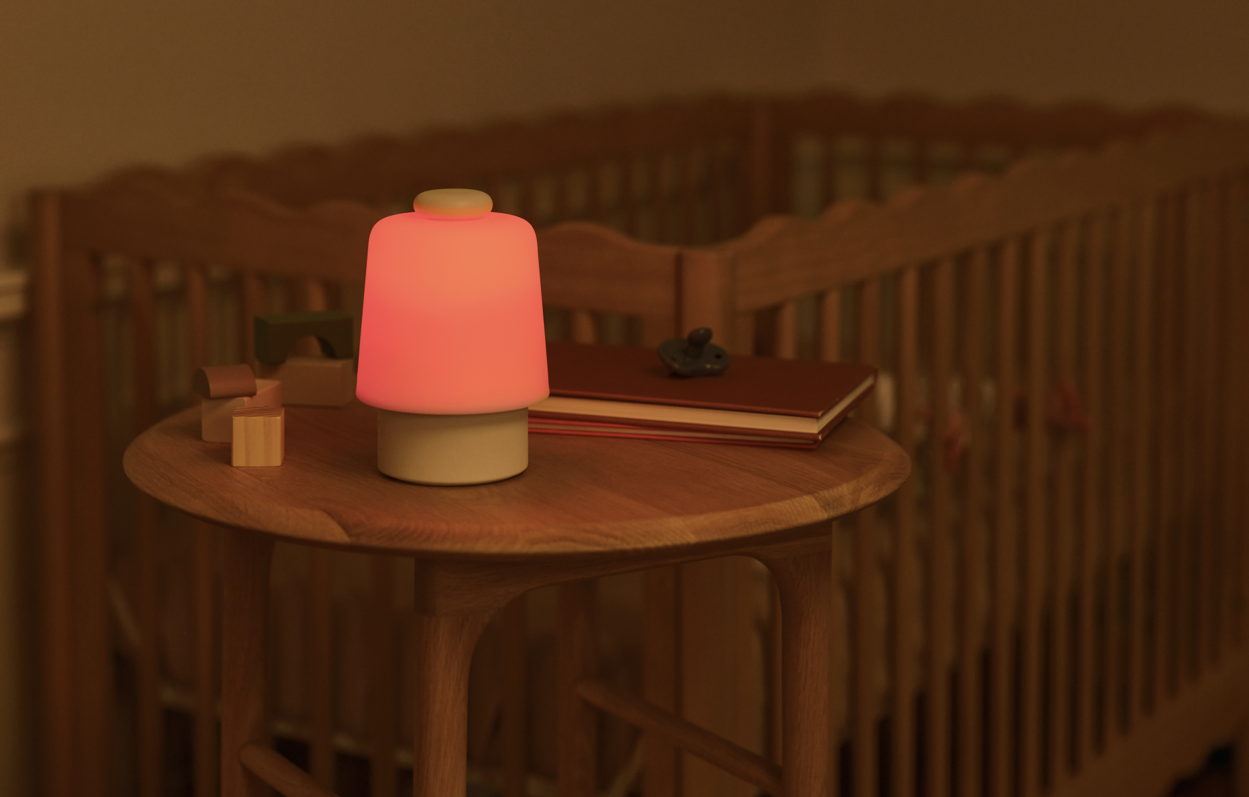 glowing red Hatch Baby lamp