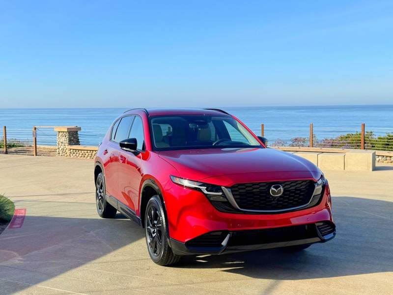 Car parked beside the Pacific Ocean