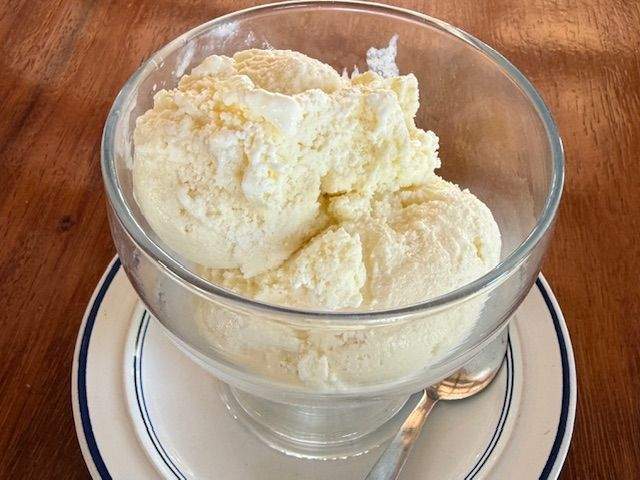 vanilla ice cream in a glass bowl