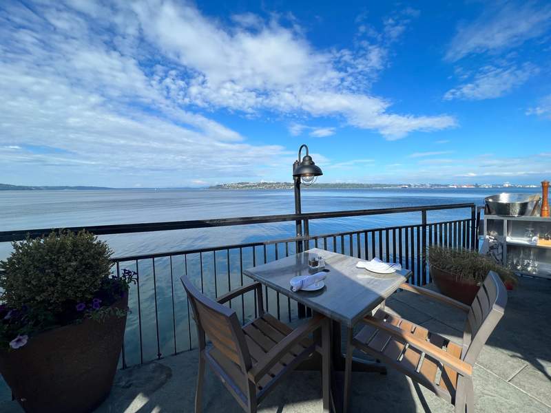 Table with two chairs overlooking Commencement Bay.