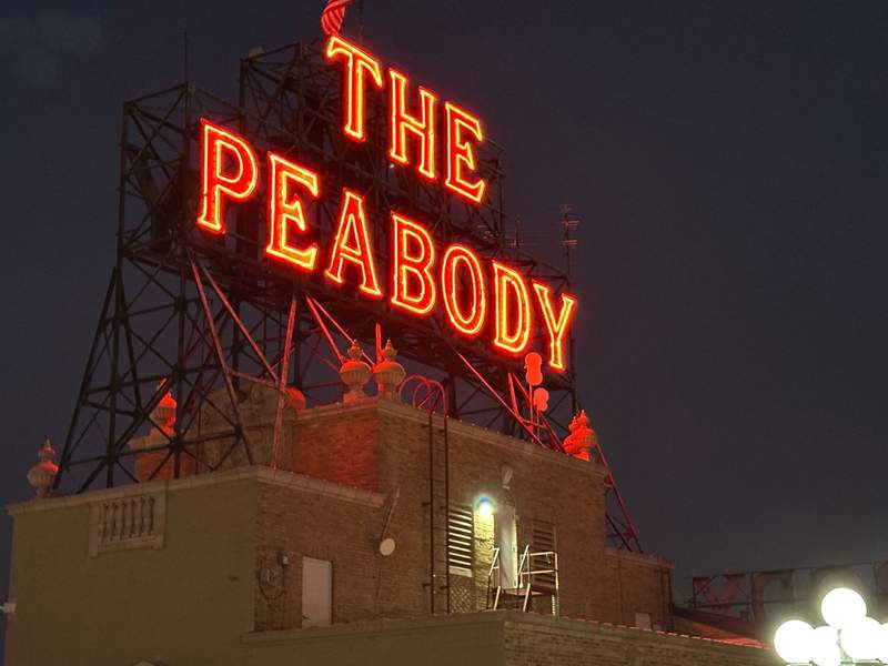 Peabody Memphis hotel lighted sign on roof.