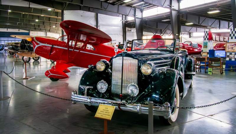 1935 Packard convertible car and an antique airplane