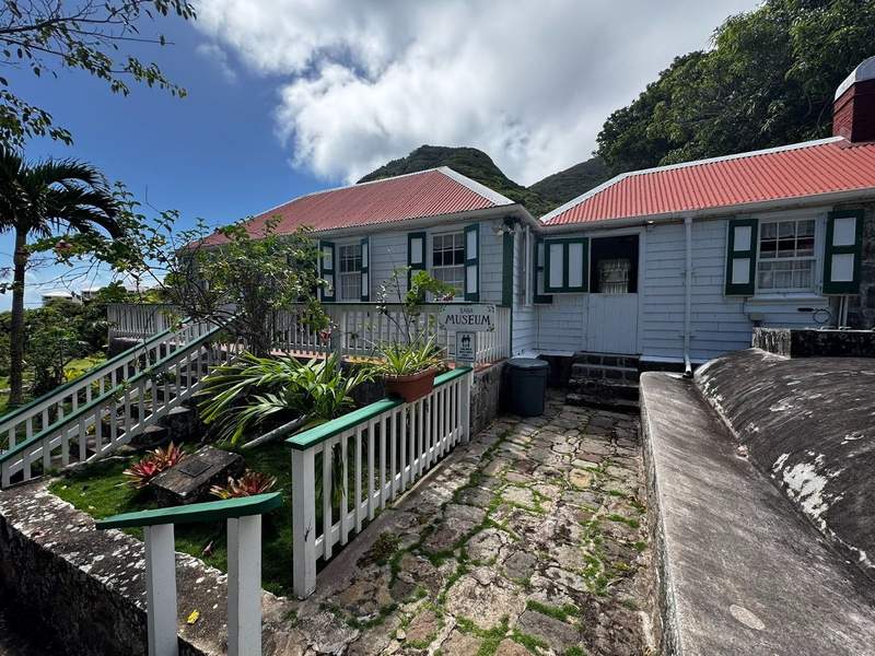 Front view of the Harry L. Johnson Museum, a preserved 19th-century sea captain’s cottage.