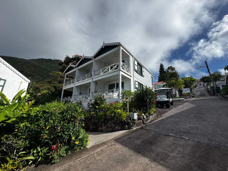 Juliana’s Hotel in Saba set against the colorful island landscape.
