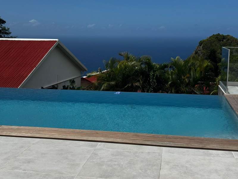 View of The Scenery Hotel’s infinity pool overlooking the island.