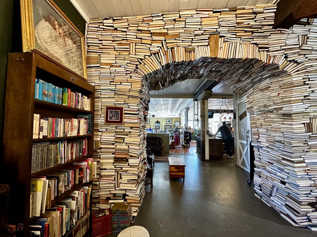 Stacked book arch in Cambria Station Antiques in Christiansburg, Virginia, near Virginia Tech.