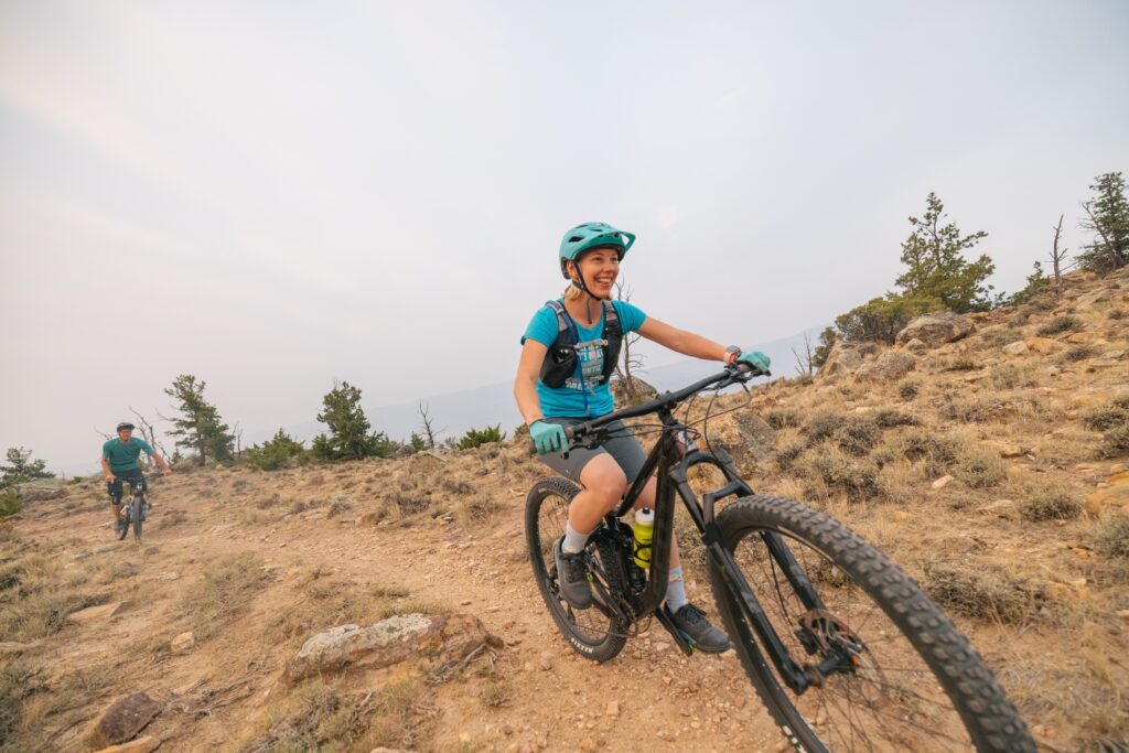 Female cyclist on a trail near Cody, Wyoming