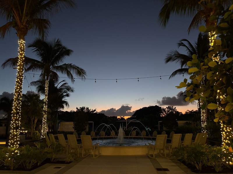 Morning sunrise with trees and fountain landscape at The Belgrove Resort & Spa