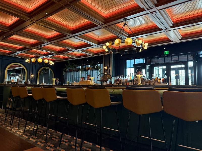 A colorful restaurant interior at Memoir in Omaha, Nebraska.