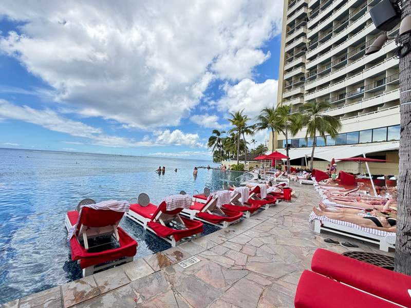 View of the Edge infinity pool and how it drops off into the ocean at the Sheraton Waikiki.
