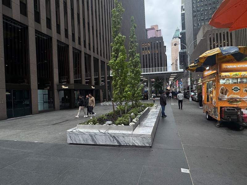 Landmark Midtown building at the Avenue of the Americas and West 49th Street in New York City New York was the fictional exterior of the Runway Magazine office in the movie The Devil Wears Prada.