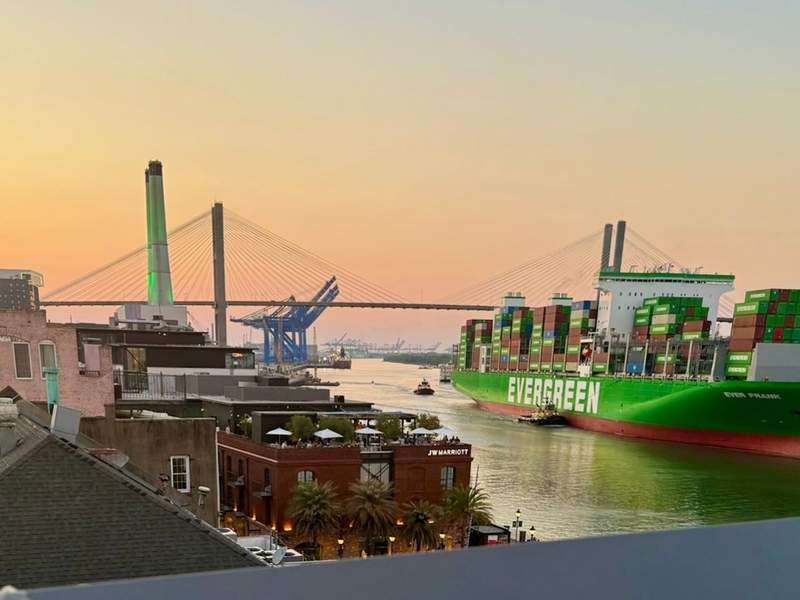 Cargo Ship on the Savannah River, with Talmadge Memorial Bridge in background at twilight. 