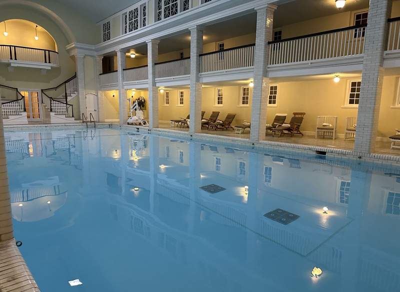 A large indoor swimming pool. 