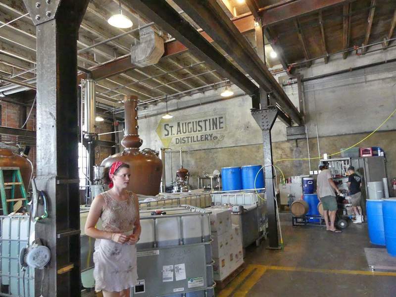 A guided tour of the St. Augustine Distillery showing the large copper distilling stills named Becky and Ella in a repurposed 1905 ice plant.