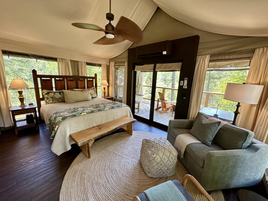 Interior of luxury safari tent at Tuxedo Falls, a forest retreat in Western North Carolina