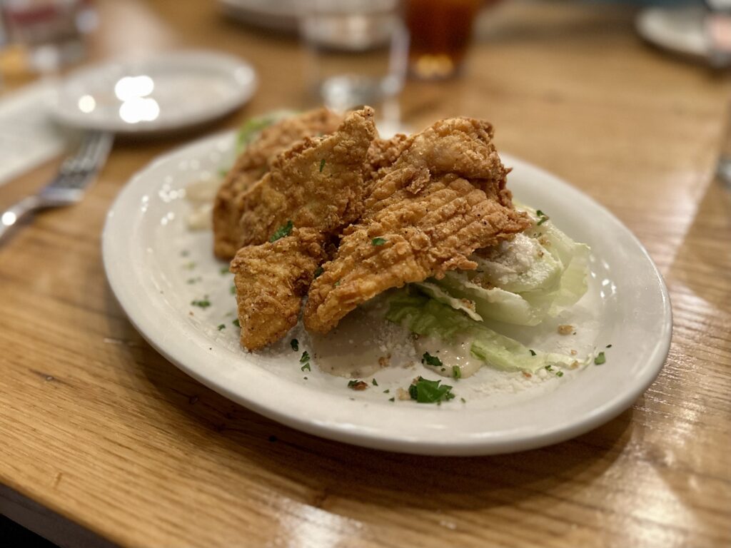 Chicken tenders atop salad greens in Flat Rock, NC restaurant
